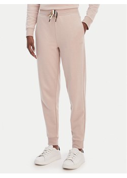 BOSS Spodnie dresowe CP Stripe 50524759 Beżowy Regular Fit ze sklepu MODIVO w kategorii Spodnie damskie - zdjęcie 188667017