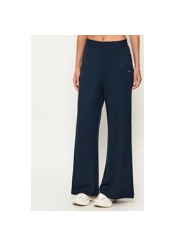 EA7 Spodnie dresowe | flare fit ze sklepu Gomez Fashion Store w kategorii Spodnie damskie - zdjęcie 188668676