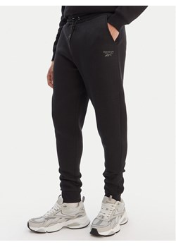 Reebok Spodnie dresowe Azaz RK25549CCM Czarny Slim Fit ze sklepu MODIVO w kategorii Spodnie męskie - zdjęcie 188677179