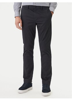 Tommy Hilfiger Spodnie materiałowe Denton MW0MW41923 Granatowy Straight Fit ze sklepu MODIVO w kategorii Spodnie męskie - zdjęcie 188752509