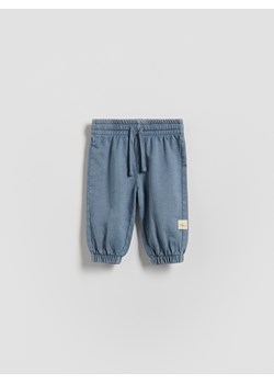 Reserved - Bawełniane spodnie - niebieski ze sklepu Reserved w kategorii Spodnie i półśpiochy - zdjęcie 188821319
