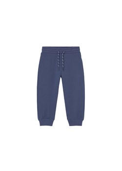 Mayoral Spodnie dresowe 711 Granatowy Regular Fit ze sklepu MODIVO w kategorii Spodnie i półśpiochy - zdjęcie 188850375