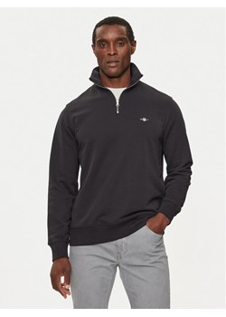 Gant Bluza Reg Shield Half Zip Sweat 2008005 Czarny Regular Fit ze sklepu MODIVO w kategorii Bluzy męskie - zdjęcie 188857838