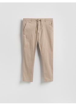 Reserved - Spodnie joggery - beżowy ze sklepu Reserved w kategorii Spodnie męskie - zdjęcie 188893515