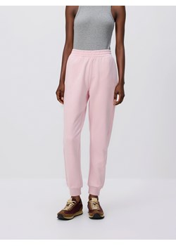 Reserved - Spodnie dresowe ze ściągaczem - pastelowy róż ze sklepu Reserved w kategorii Spodnie damskie - zdjęcie 188906498