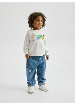 Reserved - Longsleeve SmileyWorld® - złamana biel ze sklepu Reserved w kategorii T-shirty chłopięce - zdjęcie 188906525