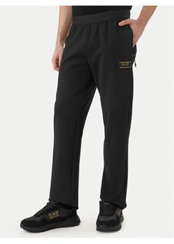 EA7 Emporio Armani Spodnie dresowe 7M001336 AF16658 UC001 Czarny Regular Fit ze sklepu MODIVO w kategorii Spodnie męskie - zdjęcie 188952997