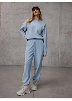 Mohito - Błękitne spodnie dresowe - błękitny ze sklepu Mohito w kategorii Spodnie damskie - zdjęcie 188955167