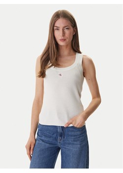 Calvin Klein Jeans Top LV047F355G Beżowy Slim Fit ze sklepu MODIVO w kategorii Bluzki damskie - zdjęcie 188961715