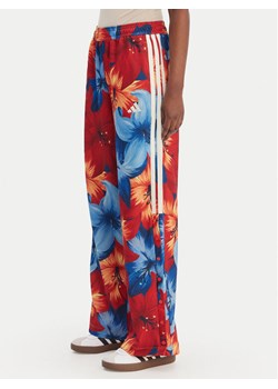 adidas Spodnie dresowe Farm Rio House Of Tiro KD4633 Niebieski Loose Fit ze sklepu MODIVO w kategorii Spodnie damskie - zdjęcie 188965088