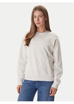 Calvin Klein Jeans Bluza LV047F204G Beżowy Regular Fit ze sklepu MODIVO w kategorii Bluzy damskie - zdjęcie 188965167