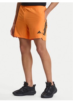 adidas Szorty sportowe D4T PrimeLift 3 Stripes KA1197 Pomarańczowy Regular Fit ze sklepu MODIVO w kategorii Spodenki męskie - zdjęcie 188965168