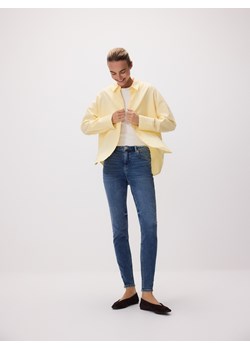 Reserved - Jeansy slim z dłuższą nogawką - niebieski ze sklepu Reserved w kategorii Jeansy damskie - zdjęcie 188969055