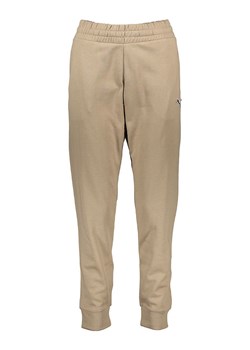 Puma Spodnie dresowe "Better Essentials" w kolorze beżowym ze sklepu Limango Polska w kategorii Spodnie damskie - zdjęcie 188972537
