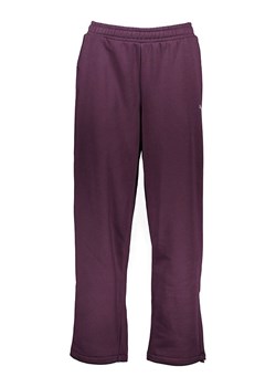 Puma Spodnie dresowe "Motion" w kolorze fioletowym ze sklepu Limango Polska w kategorii Spodnie damskie - zdjęcie 188972559