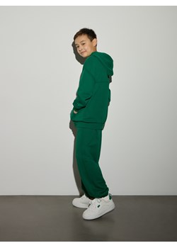 Reserved - Bawełniane spodnie jogger - zielony ze sklepu Reserved w kategorii Spodnie chłopięce - zdjęcie 188985937