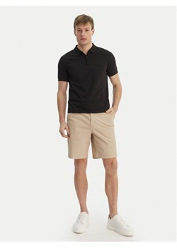 Calvin Klein Jeans Szorty materiałowe LV04RF617G Beżowy Regular Fit ze sklepu MODIVO w kategorii Spodenki męskie - zdjęcie 189020938