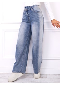 SPODNIE JEANSOWE Z SZEROKIMI NOGAWKAMI I ASYMETRYCZNYM PASEM- NIEBIESKIE ze sklepu olika.com.pl w kategorii Jeansy damskie - zdjęcie 189033197