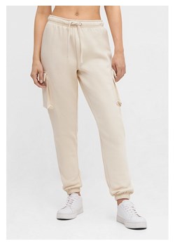 Bench Spodnie dresowe "Liat" w kolorze beżowym ze sklepu Limango Polska w kategorii Spodnie damskie - zdjęcie 189052839