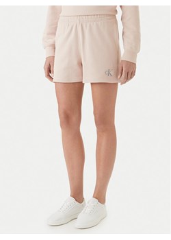 Calvin Klein Jeans Szorty materiałowe LV047B271G Różowy Regular Fit ze sklepu MODIVO w kategorii Szorty - zdjęcie 189056147
