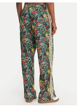 adidas Spodnie dresowe Liberty London Firebird KD5561 Kolorowy Loose Fit ze sklepu MODIVO w kategorii Spodnie damskie - zdjęcie 189066176