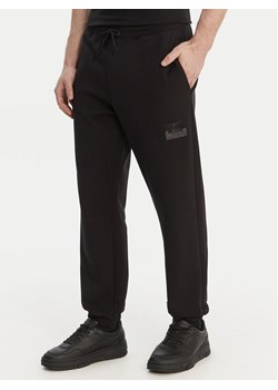 HUGO Spodnie dresowe Daylony 50557453 Czarny Regular Fit ze sklepu MODIVO w kategorii Spodnie męskie - zdjęcie 189079286