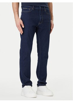 Calvin Klein Jeansy LV04RF939G Granatowy Slim Fit ze sklepu MODIVO w kategorii Jeansy męskie - zdjęcie 189099149