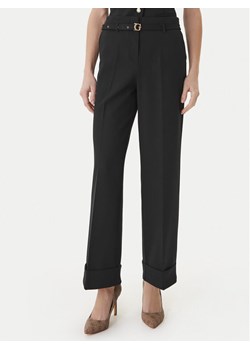 Guess Spodnie materiałowe W6GB17 W1894 Czarny Regular Fit ze sklepu MODIVO w kategorii Spodnie damskie - zdjęcie 189101815