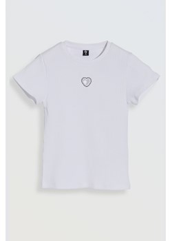 Biała bluzka z dzianiny prążkowanej z ozdobną aplikacją z przodu, Rozmiar - 140, Kolor - Biały ze sklepu REPORTER w kategorii Bluzki dziewczęce - zdjęcie 189106358