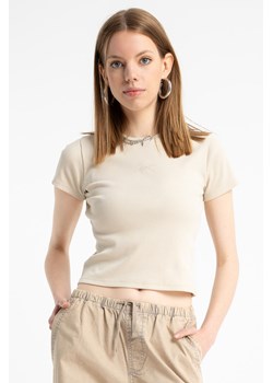 Kremowy CROP TOP z dzianiny prążkowanej, Rozmiar - 140, Kolor - Kremowy ze sklepu REPORTER w kategorii Bluzki dziewczęce - zdjęcie 189108778