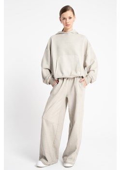 Beżowe spodnie dresowe WIDE LEG, Rozmiar - 170, Kolor - Beżowy ze sklepu REPORTER w kategorii Spodnie dziewczęce - zdjęcie 189109255