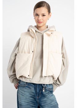 Kremowy bezrękawnik na stójce, Rozmiar - 140, Kolor - Kremowy ze sklepu REPORTER w kategorii Kamizelki dziewczęce - zdjęcie 189109729