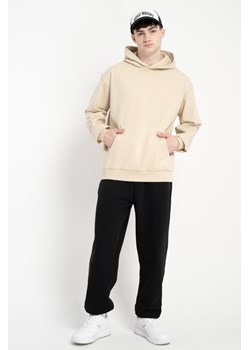 Czarne spodnie dresowe OVERSIZE bez nadruków, Rozmiar - 140, Kolor - Czarny ze sklepu REPORTER w kategorii Spodnie chłopięce - zdjęcie 189109809