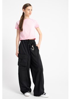 Czarne spodnie WIDE LEG z przestrzenną kieszonką, Rozmiar - 140, Kolor - Czarny ze sklepu REPORTER w kategorii Spodnie dziewczęce - zdjęcie 189110027