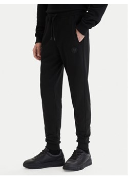 Plein Sport Spodnie dresowe SAFC MJT2788 STE003N Czarny Regular Fit ze sklepu MODIVO w kategorii Spodnie męskie - zdjęcie 189130387