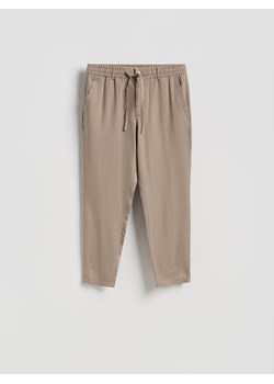 Reserved - Spodnie z lyocellu - brązowy ze sklepu Reserved w kategorii Spodnie męskie - zdjęcie 189132498