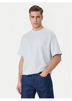 Calvin Klein T-Shirt Emblem Graphic LV14RF817G Błękitny Regular Fit ze sklepu MODIVO w kategorii T-shirty męskie - zdjęcie 189133459