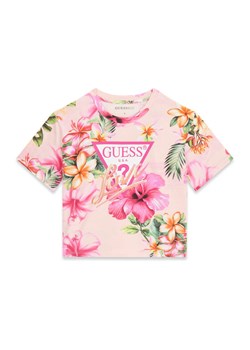 Guess T-Shirt J6GI03 K6YW4 Różowy Relaxed Fit ze sklepu MODIVO w kategorii Bluzki dziewczęce - zdjęcie 189135516