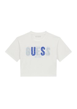 Guess T-Shirt J6GI07 K6YW4 Biały Relaxed Fit ze sklepu MODIVO w kategorii Bluzki dziewczęce - zdjęcie 189135679