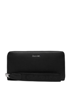 Calvin Klein Portfel Webbing Strap Long Zip Around LV04F1174G Czarny ze sklepu MODIVO w kategorii Portfele damskie - zdjęcie 189143938