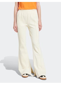 adidas Spodnie dresowe w kolorze kremowym ze sklepu Limango Polska w kategorii Spodnie damskie - zdjęcie 189173825