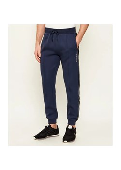 GUESS ACTIVE Spodnie dresowe Mickey | Regular Fit ze sklepu Gomez Fashion Store w kategorii Spodnie męskie - zdjęcie 189212936
