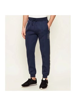 GUESS ACTIVE Spodnie dresowe Mickey | Regular Fit ze sklepu Gomez Fashion Store w kategorii Spodnie męskie - zdjęcie 189219808