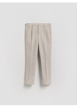 Reserved - Eleganckie spodnie - beżowy ze sklepu Reserved w kategorii Spodnie chłopięce - zdjęcie 189223697