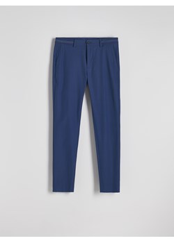 Reserved - Spodnie chino slim fit - niebieski ze sklepu Reserved w kategorii Spodnie męskie - zdjęcie 189259578