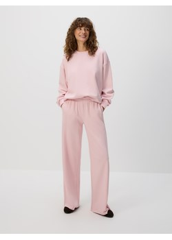 Reserved - Spodnie dresowe - pastelowy róż ze sklepu Reserved w kategorii Spodnie damskie - zdjęcie 189262788