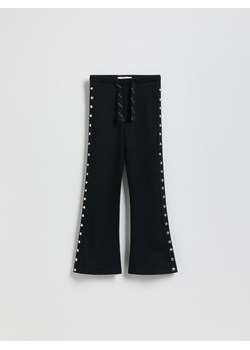 Reserved - Spodnie z aplikacją - czarny ze sklepu Reserved w kategorii Spodnie dziewczęce - zdjęcie 189263397