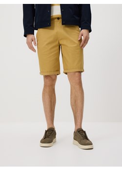Reserved - Bawełniane szorty chino - bursztynowy ze sklepu Reserved w kategorii Spodnie męskie - zdjęcie 189263537
