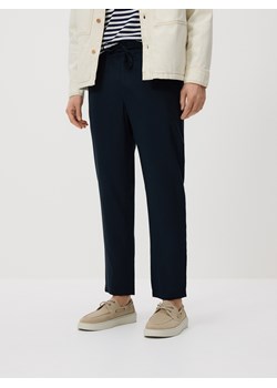 Reserved - Spodnie z lyocellu - granatowy ze sklepu Reserved w kategorii Spodnie męskie - zdjęcie 189263547