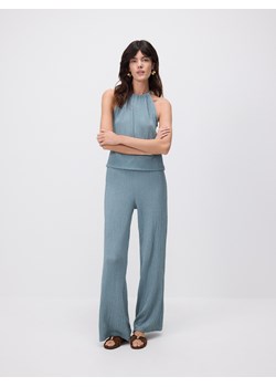 Reserved - Kreszowane spodnie flare - jasnozielony ze sklepu Reserved w kategorii Spodnie damskie - zdjęcie 189263569